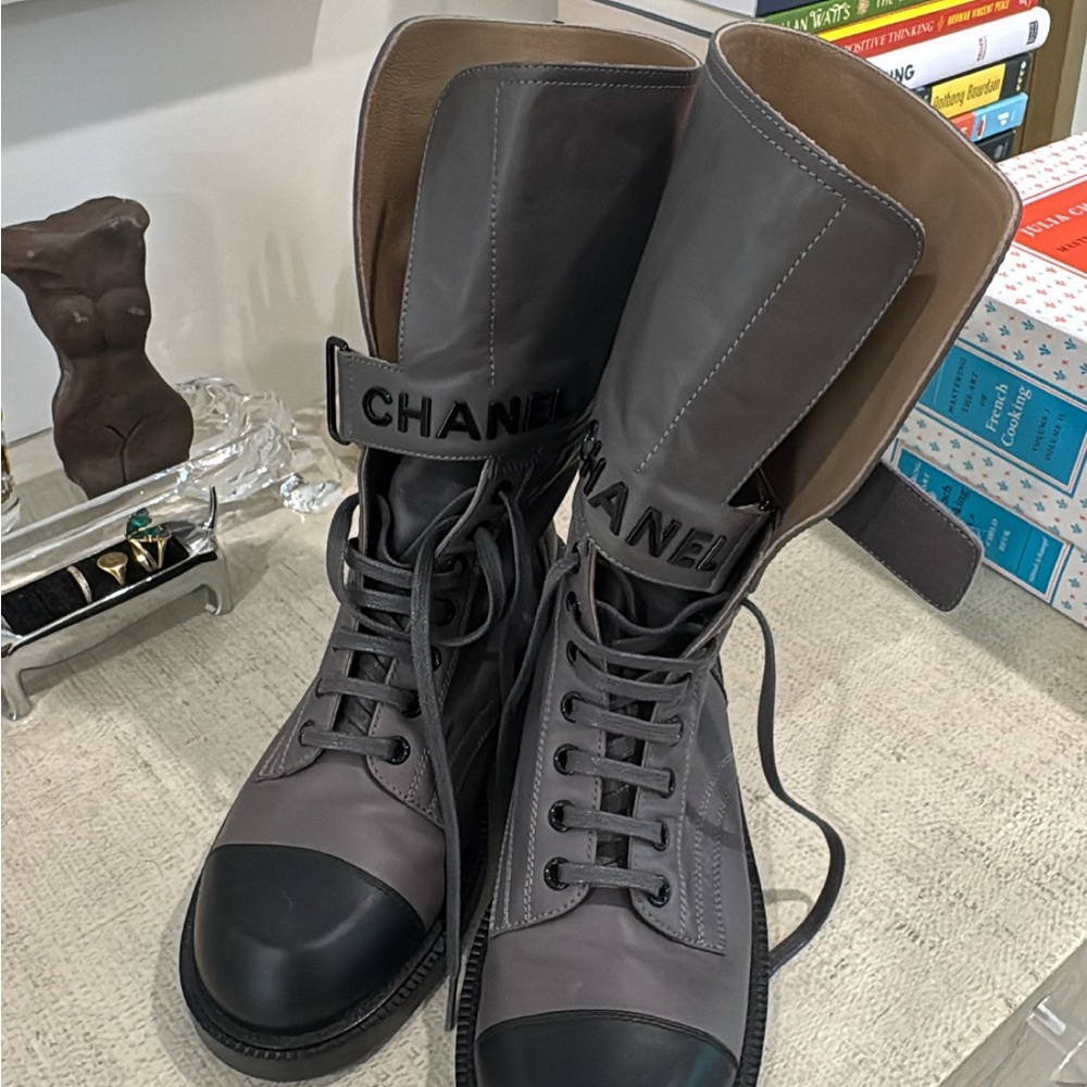 CHANEL woman’s Gray and Black Leather Lace-Up Combat Boots